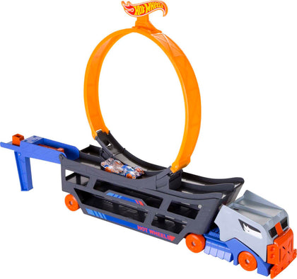 Hot Wheels Stunt & Go Track Set with 1 Toy Car, Transforming Hauler Truck with Launcher, Stores 18 1:64 Scale Cars