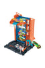 Hot Wheels City Toy Car Track Set Downtown Car Park Playset with 1:64 Scale Vehicle, 4 Levels, Working Lift & Exit Chute