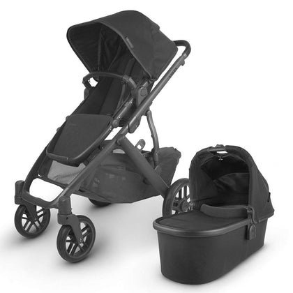 UPPAbaby Vista V2 Stroller / Convertible Single-To-Double System / Bassinet, Toddler Seat, Bug Shield, Rain Shield, and Storage Bag Included / Jake (Charcoal/Carbon Frame/Black Leather)