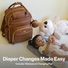 BabbleRoo Leather Diaper Bag Backpack - Baby Essentials Travel Baby Bag, Multi function, Waterproof, with Changing Pad, Stroller Straps & Pacifier Case - Unisex, Natural Brown