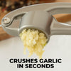 Premium Garlic Press with Soft Easy-Squeeze Ergonomic Handle, Sturdy Design Extracts More Garlic Paste Per Clove, Garlic Crusher for Nuts & Seeds, Professional Garlic Mincer & Ginger Press - by Zulay