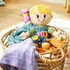 Playskool Dressy Kids Doll with Blonde Hair and Bow, Activity Plush Toy with Zipper, Shoelace, Button, for Ages 2 and Up (Amazon Exclusive)