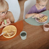 mushie Silicone Placemat for Kids | BPA-Free Non-Slip Design (Dinosaurs)