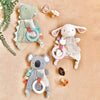 Itzy Ritzy - Bitzy Crinkle Sensory Toy with Teether; Features Ribbons, Crinkle Sound & Soft, Braided Teething Ring; Bunny
