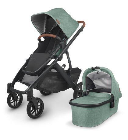 UPPAbaby Vista V2 Stroller/Convertible Single-to-Double System/Bassinet, Toddler Seat, Bug Shield, Rain Shield, and Storage Bag Included/Gwen (Green Mélange/Carbon Frame/Saddle Leather)